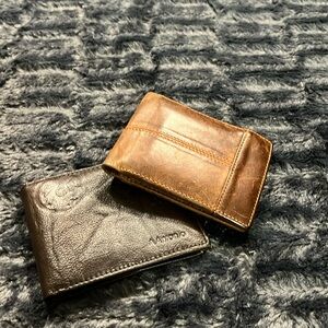 Lot of 2 leather wallets - brown.